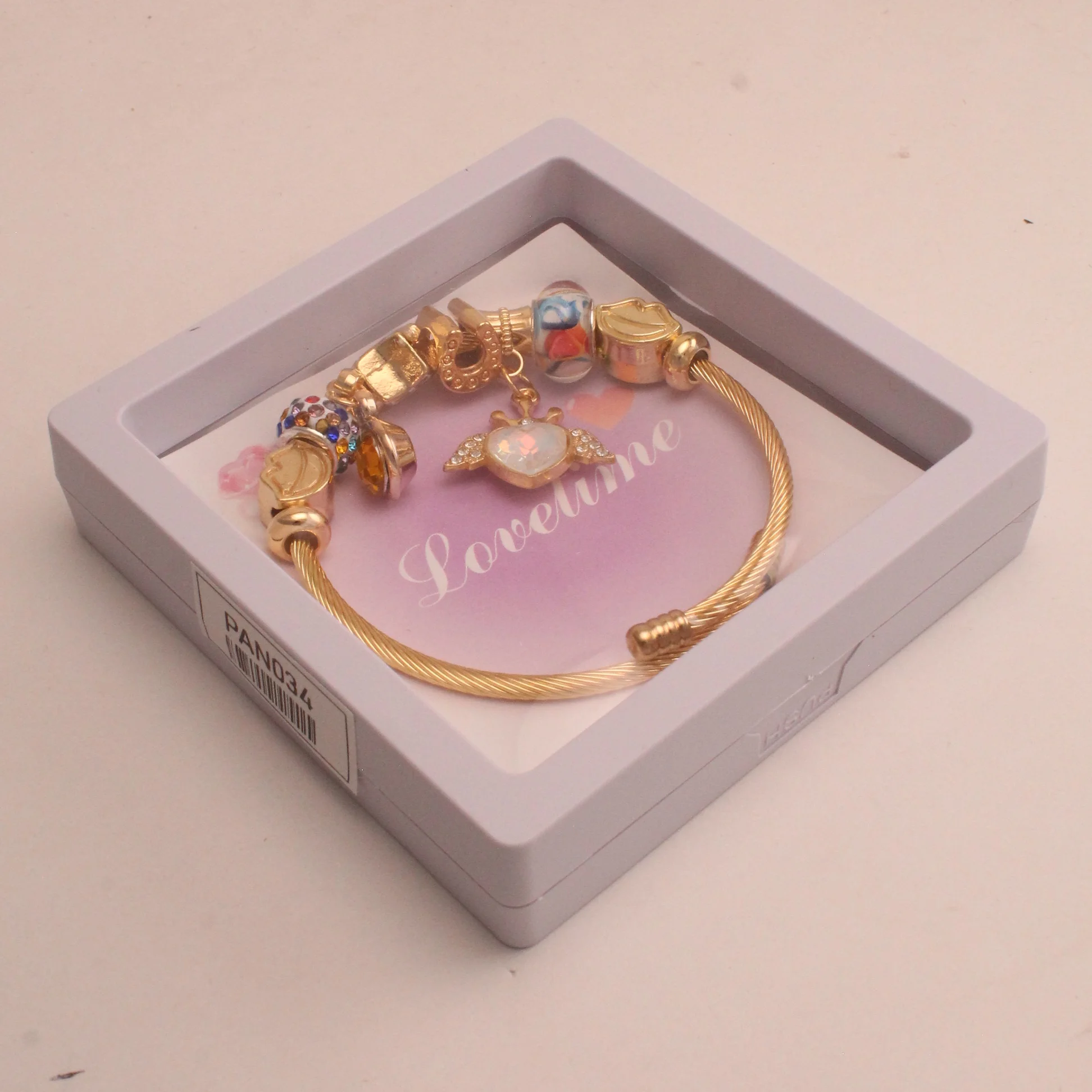 Pul. tipo pan. corazon alas rodio graduable - PAN034