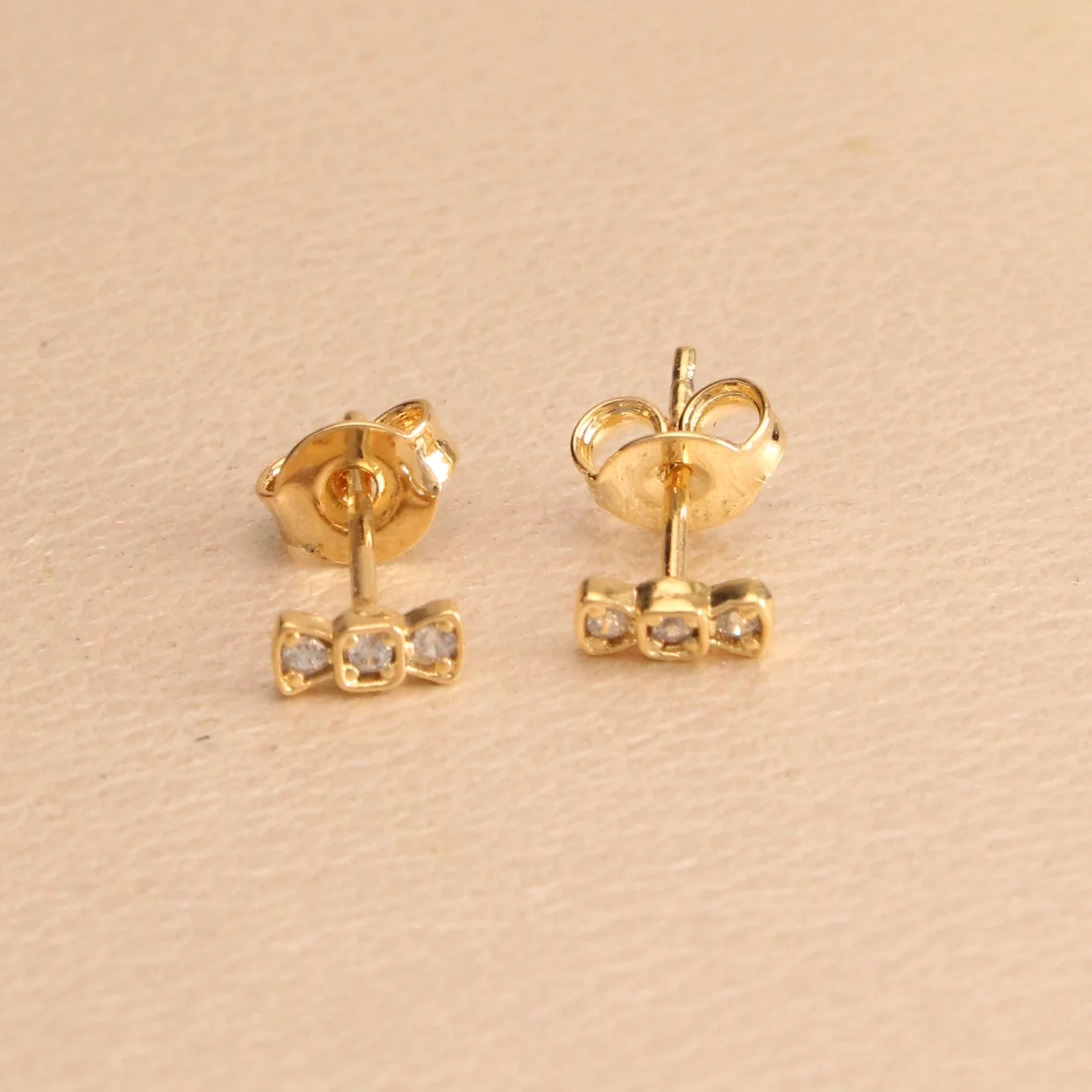 Top. Moño Mini  Oro Laminado 0.3 Cm - TOG233