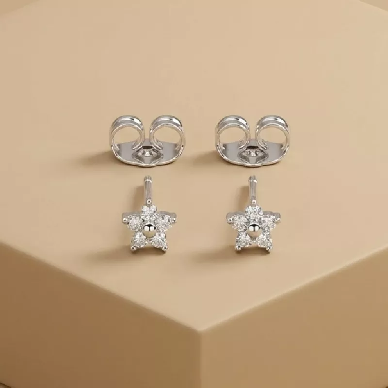 Top. Estrellas Rodio 0.7cm - TRH182